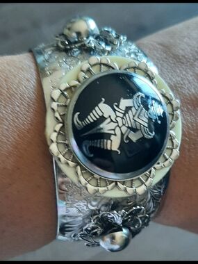 Silver-Tone Decorative Cuff Bracelet with Black Ivory Medallion